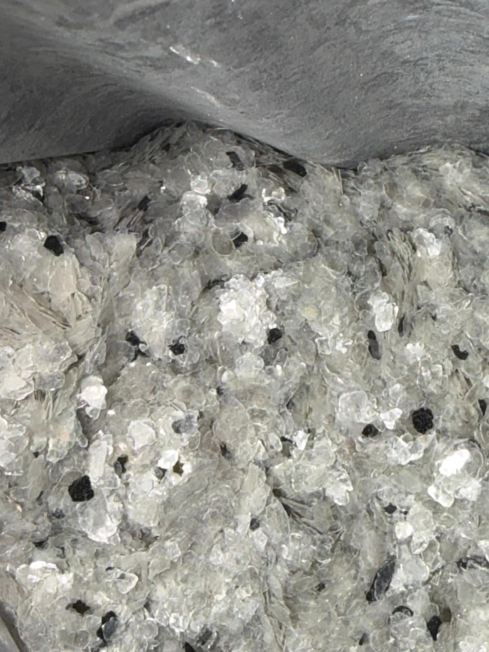 Mica close-up — silvery translucence indicating high-quality muscovite