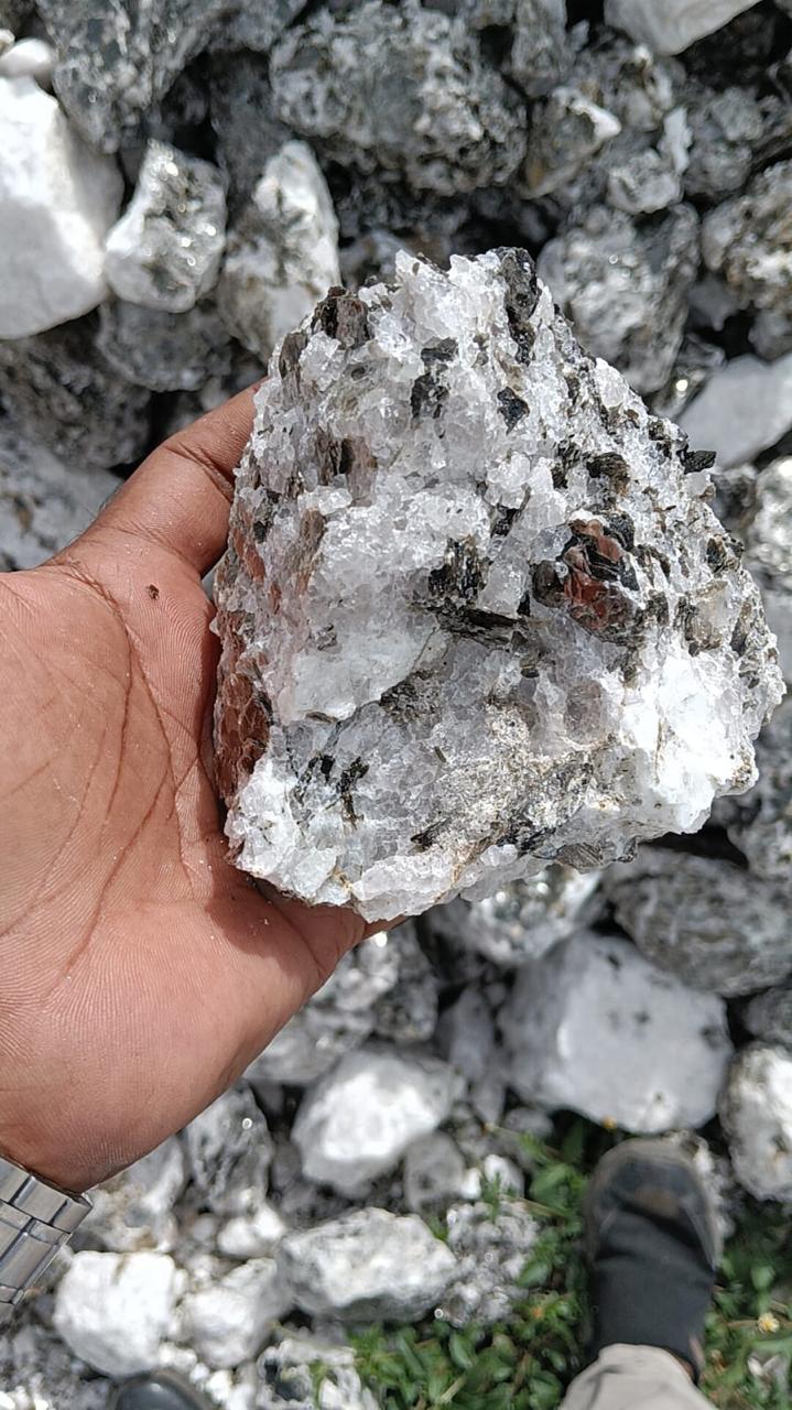 Mica with quartz matrix — source ore showing intergrowth
